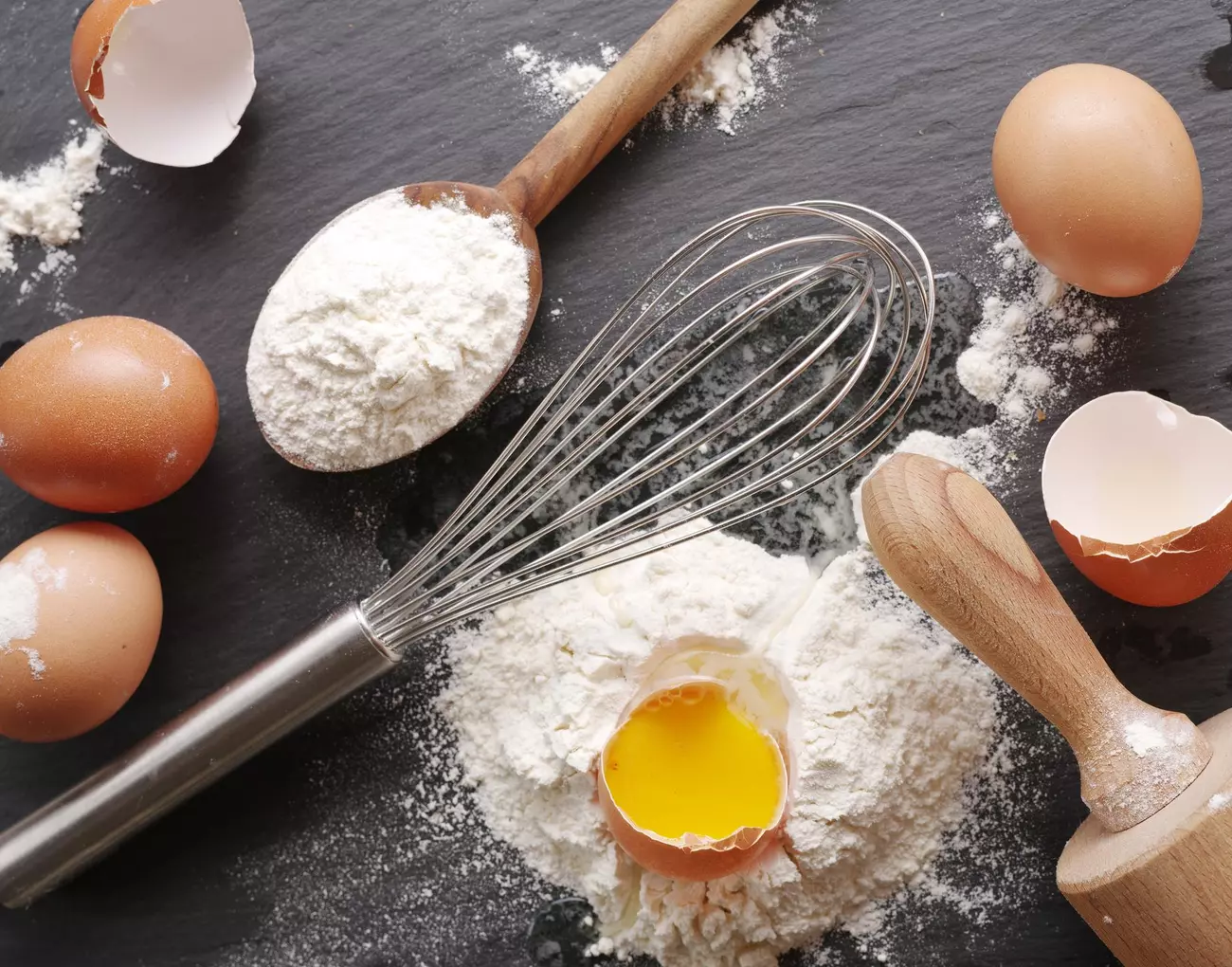 Dough preparation. Baking ingredients: egg and flour.